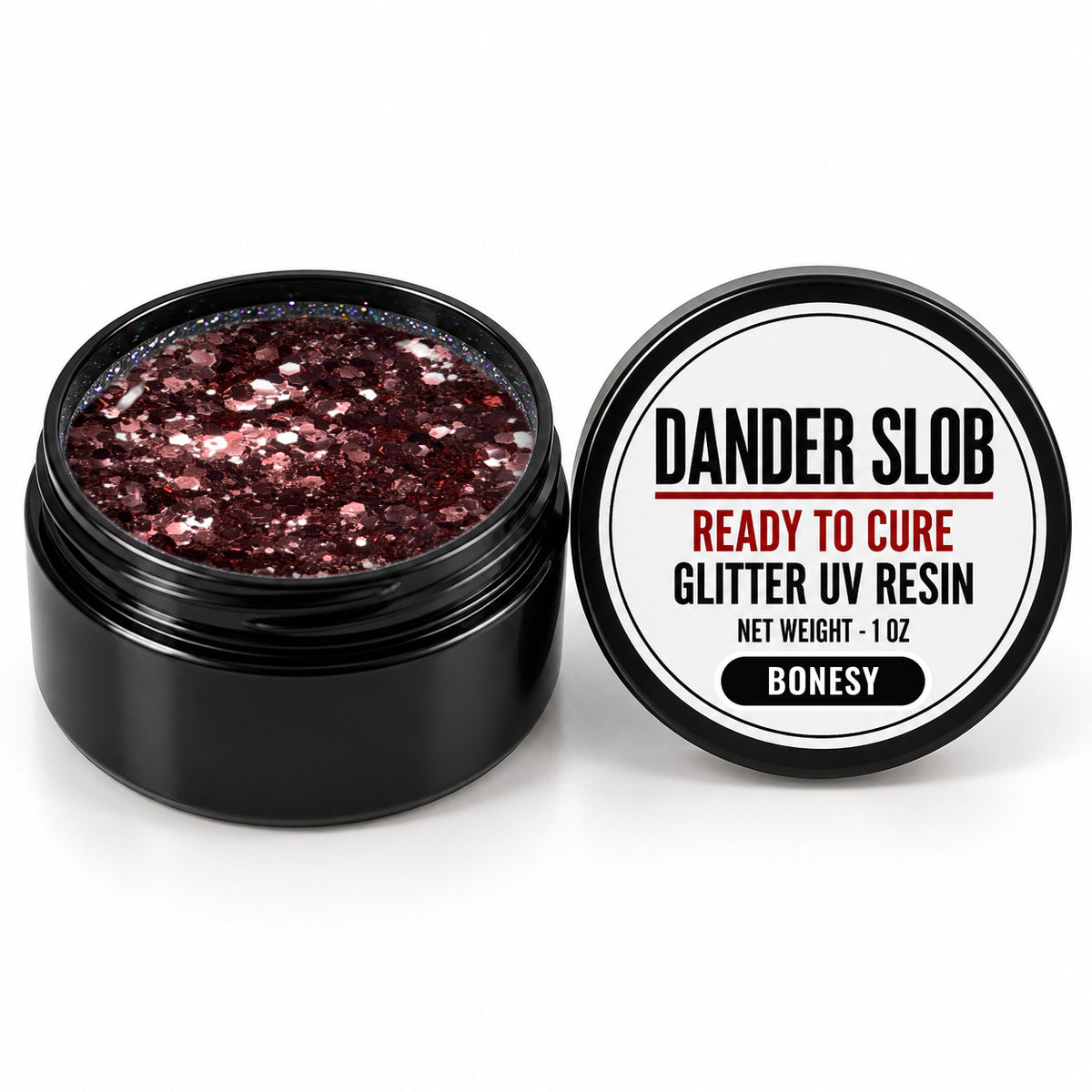 Craft Bully Dander Slob Bonesy glitter UV resin in a 1 oz black jar.