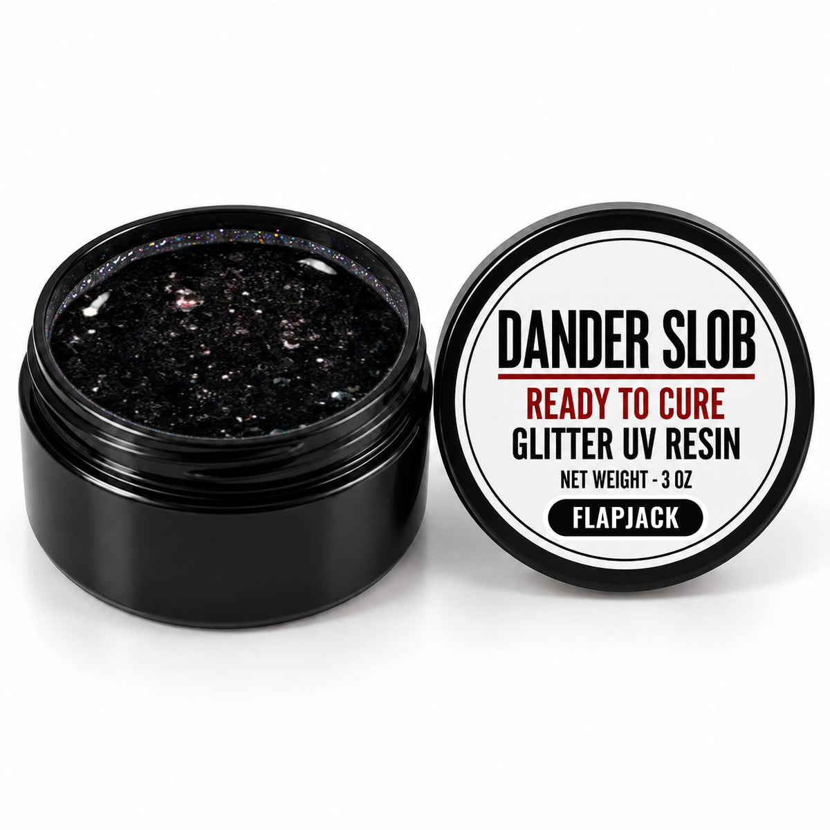Craft Bully Dander Slob Flapjack glitter UV resin in a 3 oz black jar.