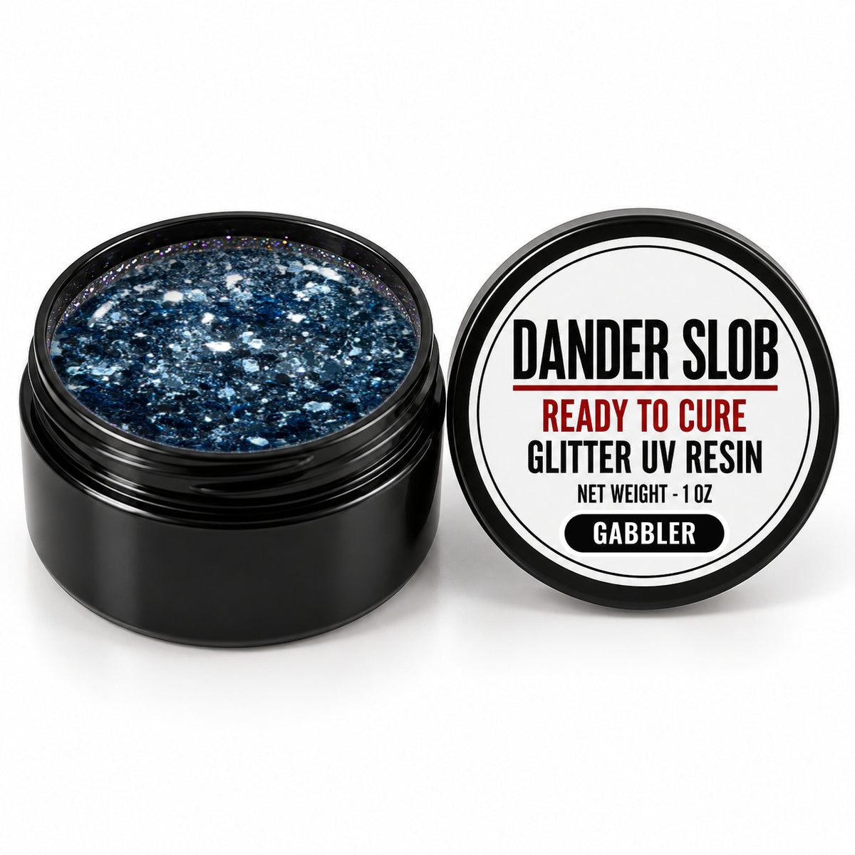 Craft Bully Dander Slob Gabbler glitter UV resin in a 1 oz black jar.