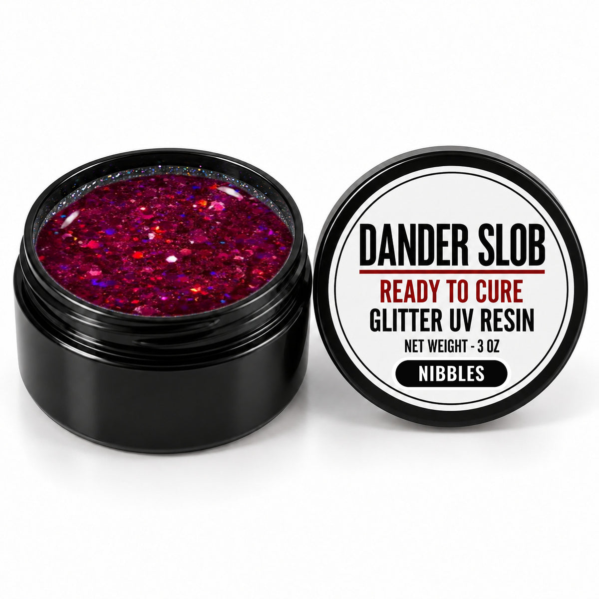 Craft Bully Dander Slob Nibbles glitter UV resin in a 3 oz black jar.
