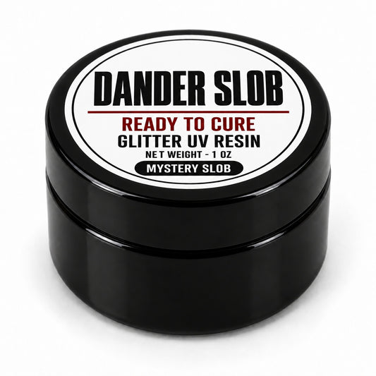 Craft Bully Dander Slob Mystery Slob glitter UV resin in a 1 oz black jar.