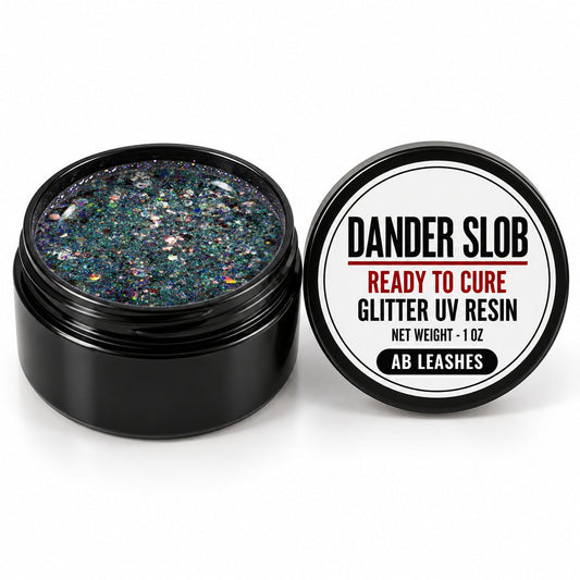 Craft Bully Dander Slob AB Leashes glitter UV resin in a 1 oz black jar.