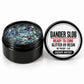 Craft Bully Dander Slob Escape Artist glitter UV resin in a 3 oz black jar.