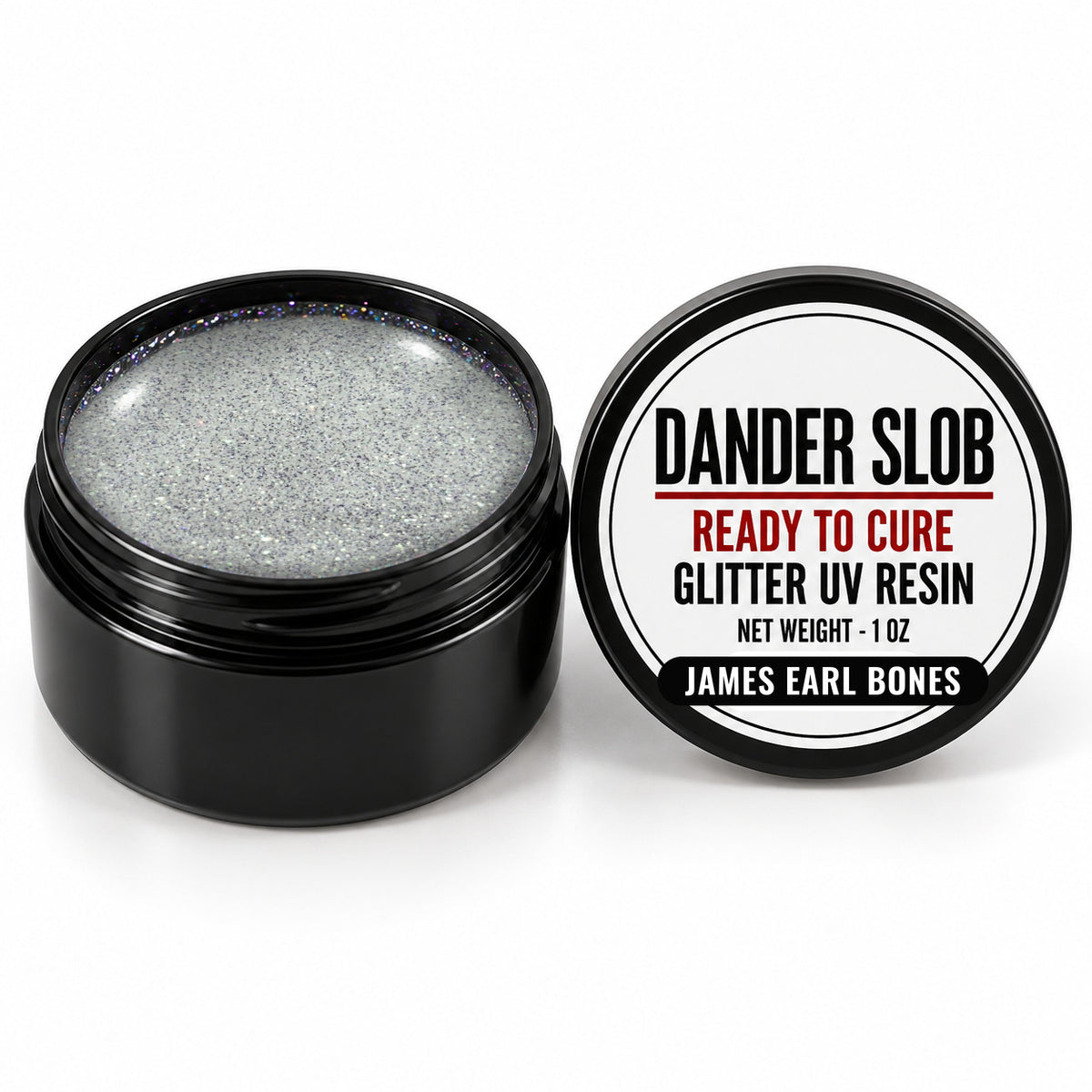 Craft Bully Dander Slob James Earl Bones glitter UV resin in a 1 oz black jar.