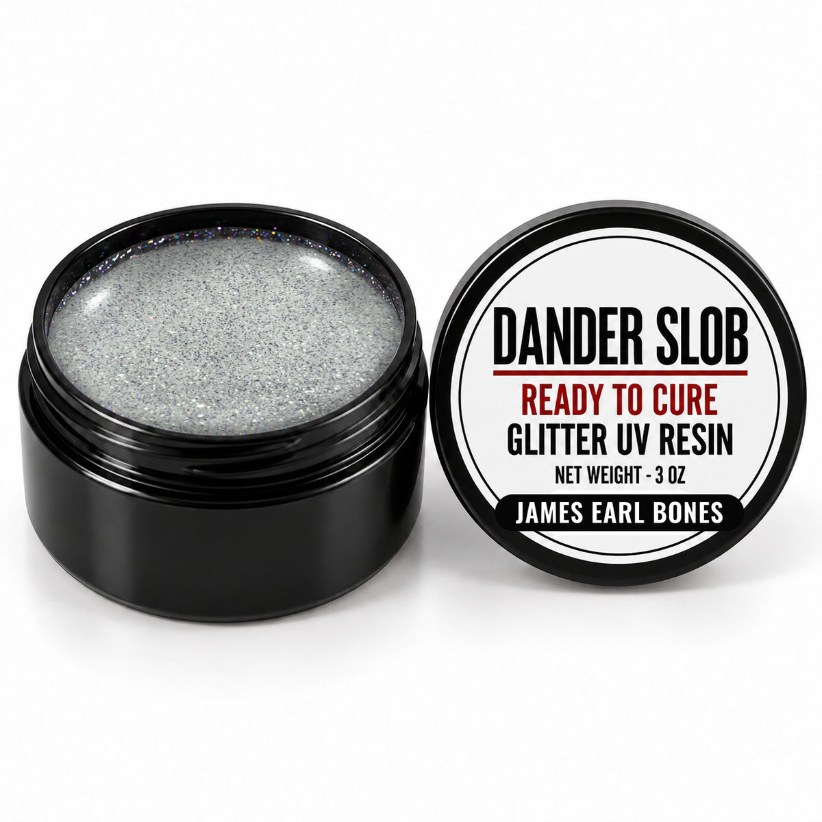 Craft Bully Dander Slob James Earl Bones glitter UV resin in a 3 oz black jar.