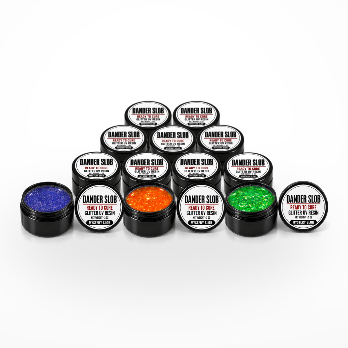 Craft Bully Dander Slob Mystery Slob 12 pack of 3 oz glitter UV resin jars, three open to show fine and chunky glitter.