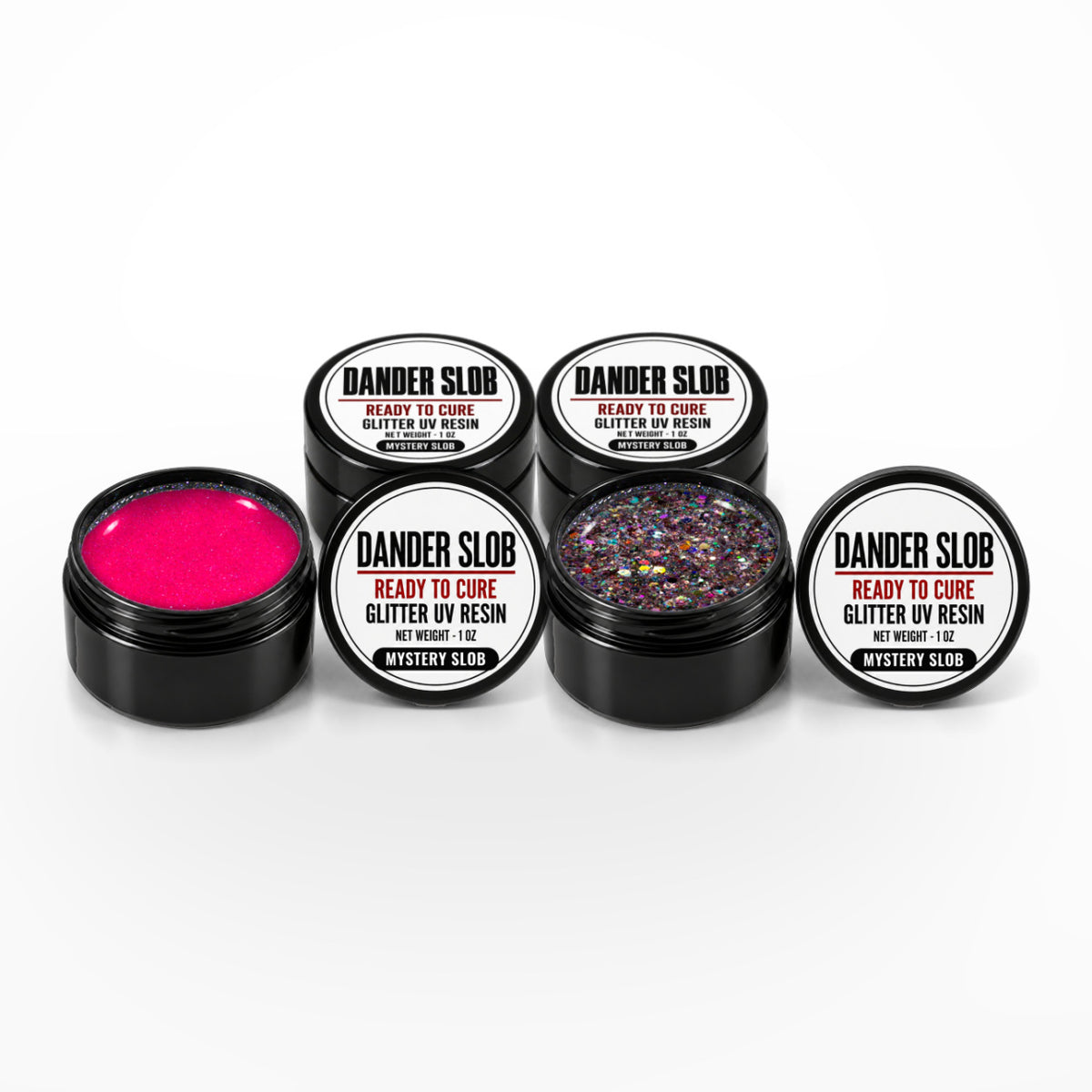 Craft Bully Dander Slob Mystery Slob 4 pack of 1 oz glitter UV resin jars, two open to show fine and chunky glitter.