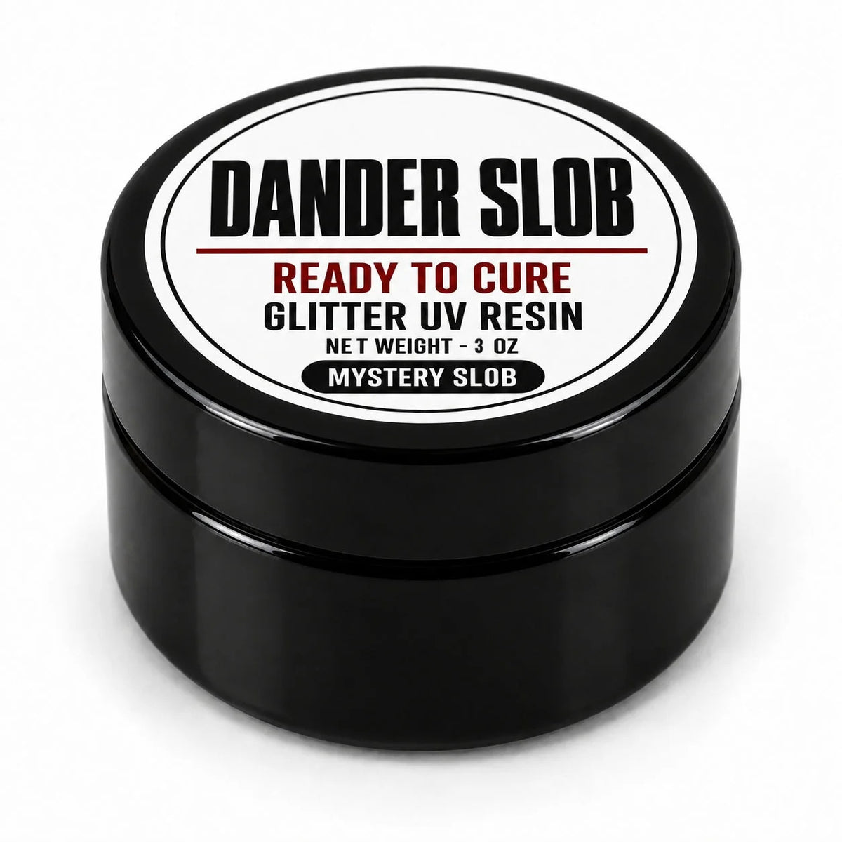 Craft Bully Dander Slob Mystery Slob glitter UV resin in a 3 oz black jar.