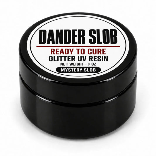Craft Bully Dander Slob Mystery Slob glitter UV resin in a 3 oz black jar.