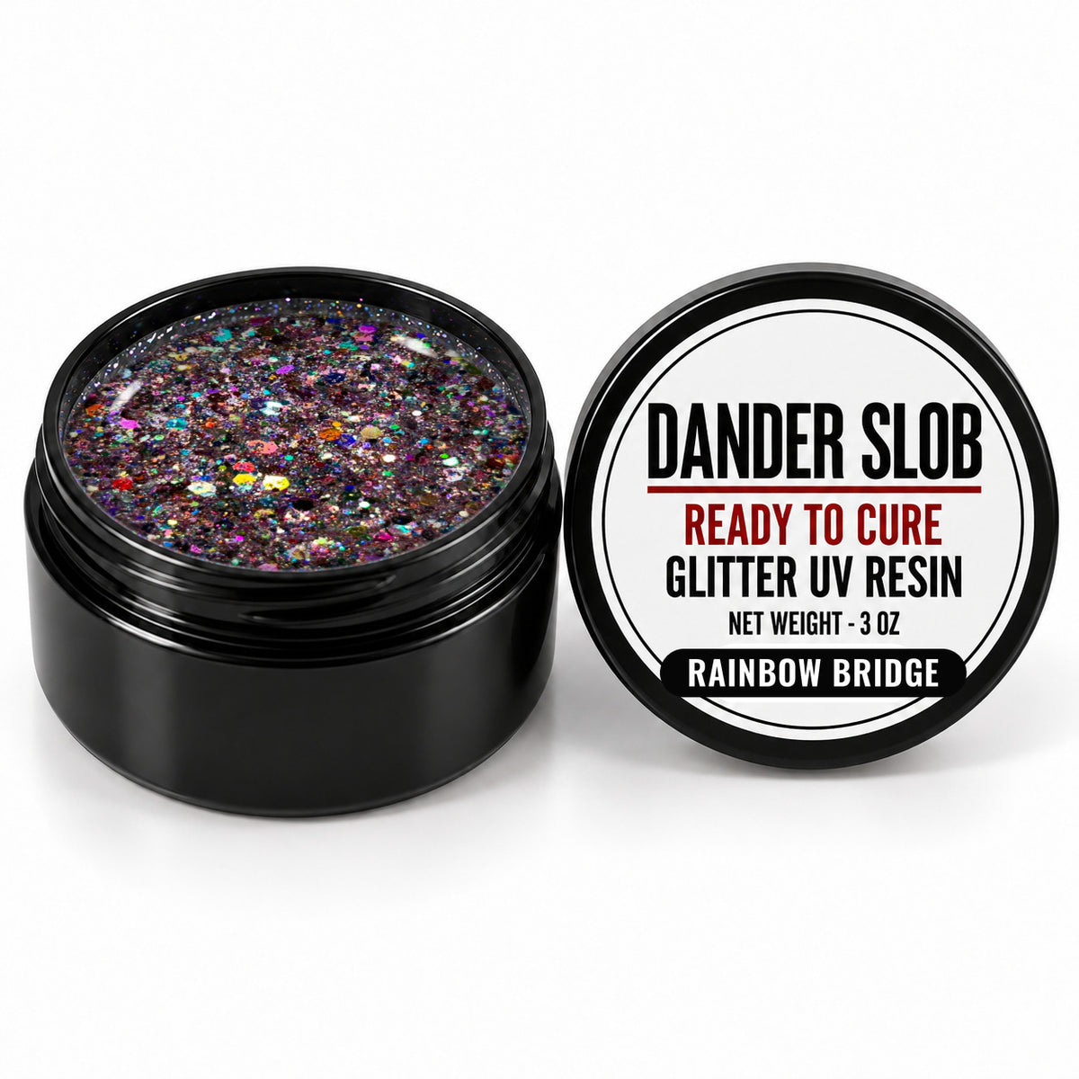 Craft Bully Dander Slob Rainbow Bridge glitter UV resin in a 3 oz black jar.
