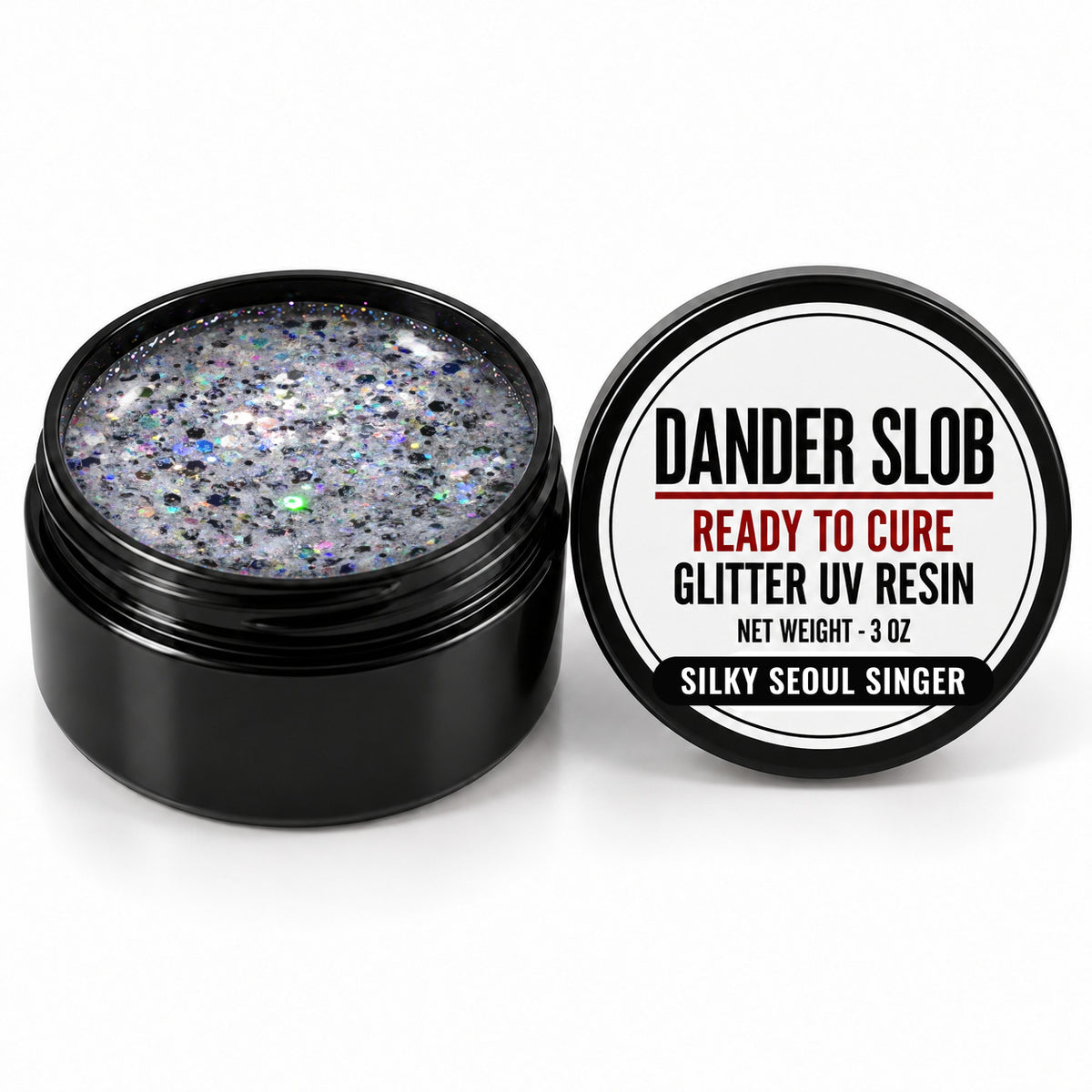 Craft Bully Dander Slob Silky Seoul Singer glitter UV resin in a 3 oz black jar.