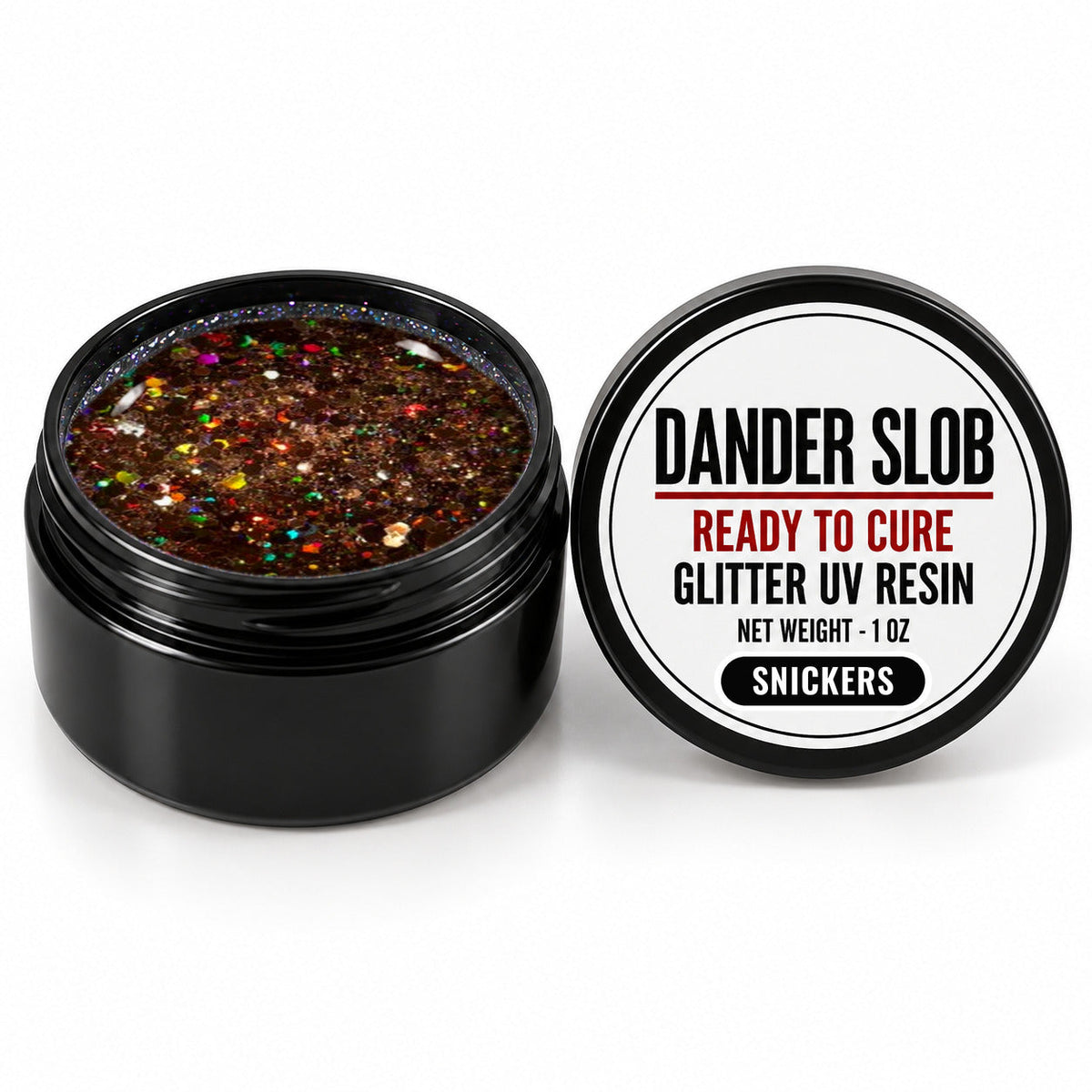 Craft Bully Dander Slob Snickers glitter UV resin in a 1 oz black jar.